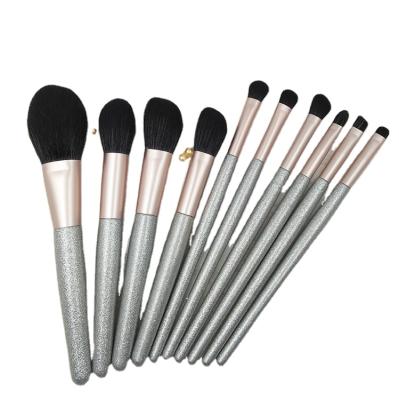 China Angular Blush BLING Luxury Travel Handle 11 Piece Set Gray White Professional Makeup Brush Set for sale