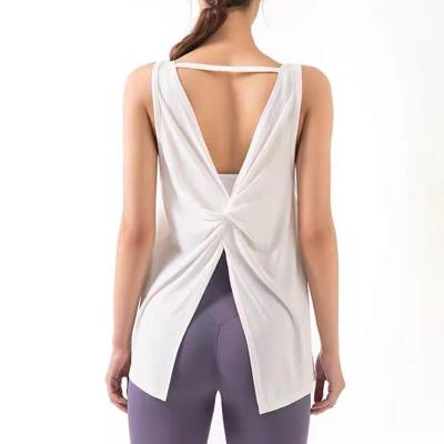 China Hot Selling Fashion Sports Yoga Ladies Yoga Streetwear Vest Breathable Vest Hollow Out Short Loose Top Hot QUICK DRY Ladies Sexy Yoga Clothes for sale