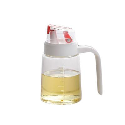 China 300ml viable Olive Glass Kitchen Oil Bottle dispenser with handle, glass bottle for Olive Oil for sale