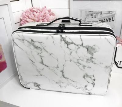 China Lady 2 Layers New Pattern Large Capacity Bag Women Cosmetic Travel PU White Marble Portable Makeup Bag With Shoulders for sale