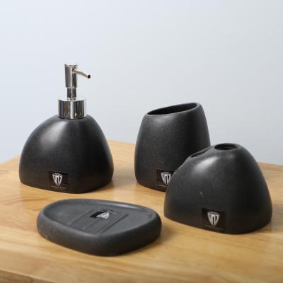 China Factory price viable high quality matte black 4 pieces modern hotel used ceramic bathroom accessories set for home for sale