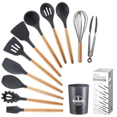 China Sustainable 12 Pcs Top Selling Silicone Kitchen Utensils Cooking Tools Cookware Set With Wooden Handle for sale