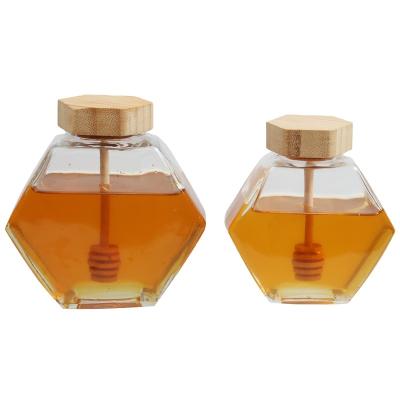 China 220ml 380ml New Design Sustainable Honey Jar Bee Shaped Glass With Wooden Plunger Lid for sale