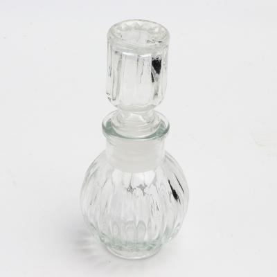 China Wholesale 2oz 60ml Mini Beverage Storage Glass Jar With Lid Glass Use For Whiskey Liquor Alcohol Fragrance Oil for sale