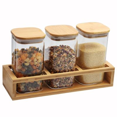 China Wholesale 4pcs Large Borosilicate Glass Set Heatable Food Storage Jar High Suit With Bamboo Lid Square for sale