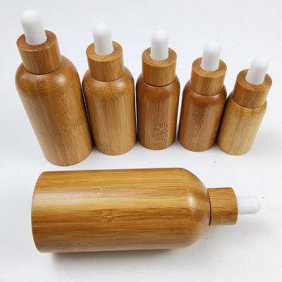 China 10ml 15ml 20ml 30ml 50ml 100ml Portable Bamboo Essential Oil Dropper Glass Bottle For Serum Beard Oil Hair Oil for sale