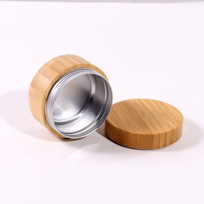 China Cosmetic Tin Can 10g 15g 20g 25g 30g 50g 60g 80g 100g Metal Tin Can Packaging Bamboo Aluminum Jar With Bamboo Lid for sale