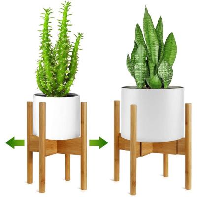 China Modern Natural Bamboo Expandable Raised Plant Stand for Indoor Planters and Flower Racks (No Pot Included) for sale