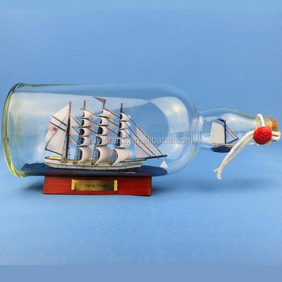 China Europe 11inches Glass Ship In Bottle For Bahamas Company Souvenirs Products for sale