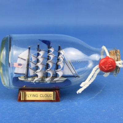 China Europe Souvenir Gifts 5inches Flying Cloud Glass Boat In A Bottle for sale