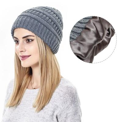 China Custom Woman Beanie Hat Chunky Knit Satin Lined Slouchy Eco-Friendly Winter Wool Toque With Silk Lining for sale