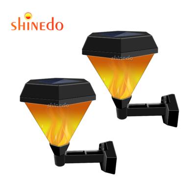 China Creative Yellow Solar Garden LED Fire Christmas Lights Decoration Flame Flashing Lamps for sale