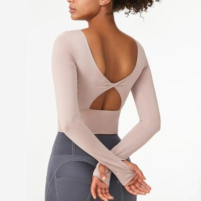 China Custom Breathable Long Sleeve Yoga Shirt Womens Sexy Up-To-Date Crop Top With Chest Pads Wholesale Female Fitness Wear for sale