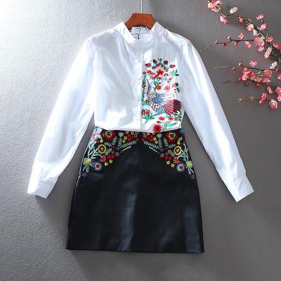 China Anti-pilling Long Line Embroidered Women's Two-piece Skirt Fashion Suit Flower Sleeve Shirt Personality Leather A Skirt for sale