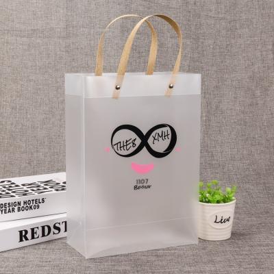 China XYDAN Wholesale Custom Bag Handled Transparent PVC Logo Shopping Pp Plastic Tote Gift Bag for sale