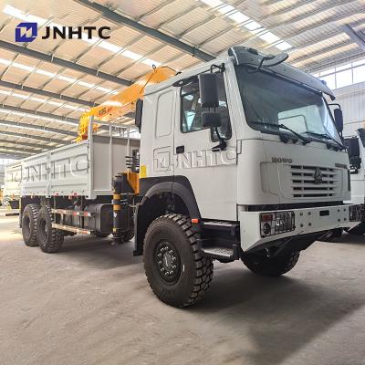 China SINOTRUK HOWO WD 6X6 forward all wheel drive cargo truck dropside truck with 12tons truck boom mounted crane > 8L for sale