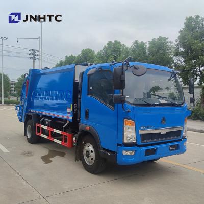 China Construction worksÂ   SINOTRUK HOWO 8 ton garbage compactor truck for sale in philippines homan garbage disposal truck for sale