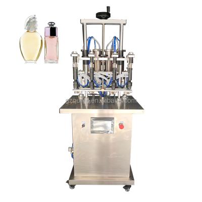 China Good Price Semi Automatic Pneumatic Fragrance Cologne Perfume Liquid Oil Vial Bottle Vacuum Refill Fill Bottling Machine Small en venta