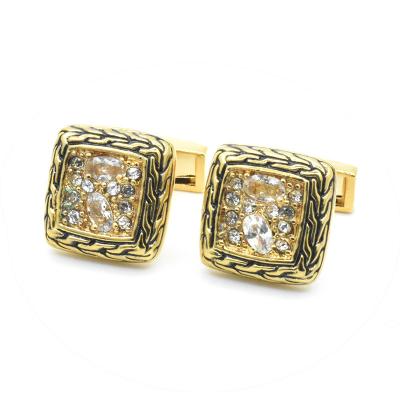 China Popular Luxury Classic Black Enamel Diamond Crystal Cufflinks Gold Color Classic Zircon Cufflinks For Groom Wedding Business Men's Cufflinks for sale