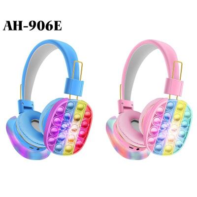 China AH-906E LED Light Moving Person Earphone Decompression Silicone Headset Bubble Toys Sensory Toy Digital Wireless Stereo Headphones for sale