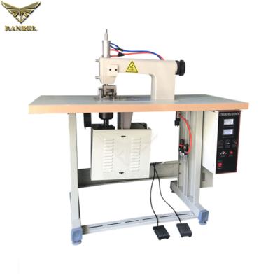 China Manual ultrasonic sewing machine how to make 2000W dresses nonwoven medial manual ultrasonic sewing machine price and manufacturer for sale