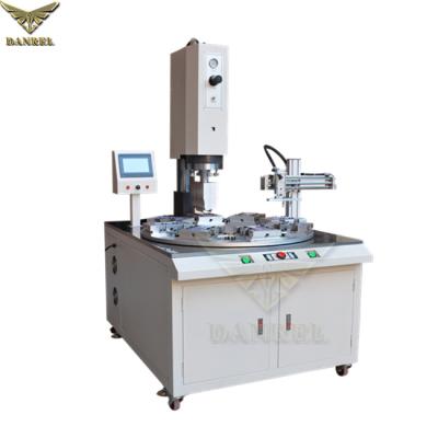 China Cheap Price Rotary Table Clamshells Products Automatic PVC And PET Ultrasonic Blister Sealing Machine With Robot Arm for sale