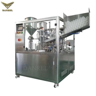 China Full Automatic Food Fast Speed ​​PE Double Chamber Ultrasonic Tube Filling And Sealing Machine For Cosmetic Cream for sale