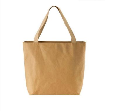 China Wholesale Custom Logo Eco - Friendly Handled Kraft Paper Luxury Brown Washable Shopping Bags for sale