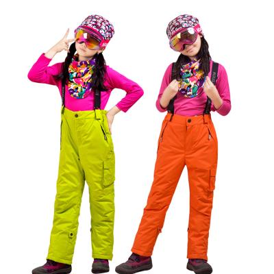 China Adult Outdoor Waterproof Breathable Solid Color Snow Warm Orange Pants For Kids for sale