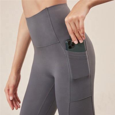 China New Design Breathable Cloud Feeling Traceless Women High Waist Tight Buttocks Lift Up Naked Fitness Yoga Pants for sale