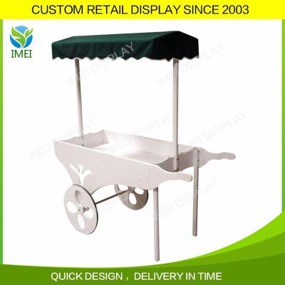 China Custom Decorative Wooden Roof Cart Wooden Fabric Cart With Wheels for sale