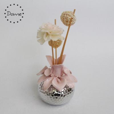 China Sustainable Home Decor Flower Reed Diffuder Ceramic Diffuser Bottle Design for sale