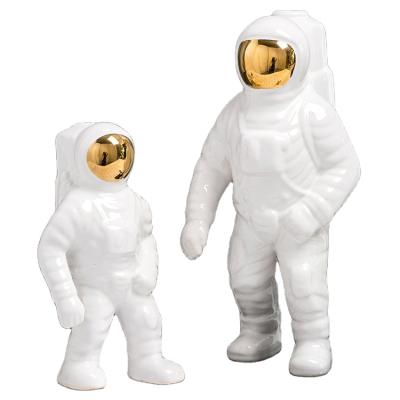 China Modern Ceramic Astronaut Flower Vase Nordic Europe Table Decoration White And Gold for sale