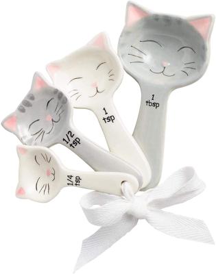 China Cute Cat Shaped Ceramic Measuring Spoons Kitchen Sustainable Set of 4 Small Kittens Set with Ribbon for sale