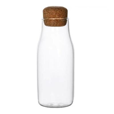 China 150ml 300ml 700ml Fully Stocked Heatable Cheap Price Storage Glass Jars With Bamboo Lid for sale