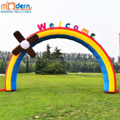 China For zoo outdoor advertising/2018 park decoration hot rainbow inflatable welcome arch with big sun for park advertising for sale