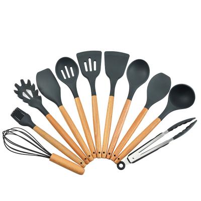 China Stocked Wholesale Customized Wooden Set of 11 Piece High Temperature Heat Resistant Silicone Handle Kitchen Utensils for sale