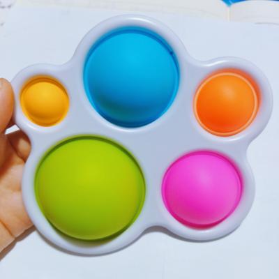 China 2021 Factory Direct Sale Custom Kids Action Training Ability Simple Snap Button Toys and Gifts for Babies Jump Up Push Bubbles Silicone Stirring Person Toy Keychain for sale