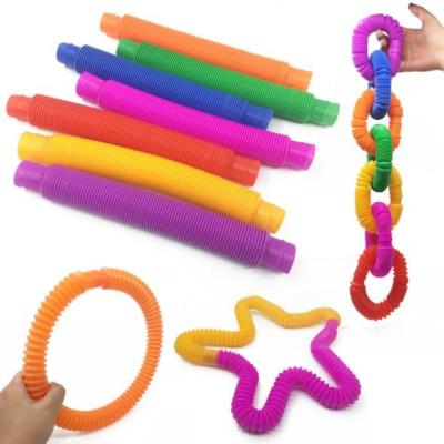 China Novelty Toys Wholesale Colorful Cheap Kids Autism Plastic DIY Building Busy Person Sensory Tools Pop Tubes Whistle Sensory Toys For Kids Stretch for sale