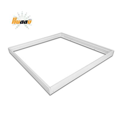 China Desk Led 600x600 Aluminum Silver White 60x60 2x2 Led Surface Mounted Panel Light Frame for sale