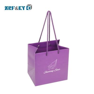 China Fashion Recyclable Custom Purple Recycled Paper Packaging Shopping Bags With Handles for sale