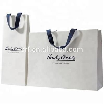 China Recyclable Custom Recycled White Ladies Carrier Kraft Brown Shopping Paper Gift Bags for sale