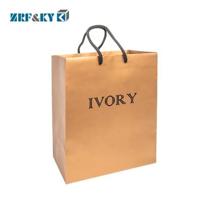 China Recycled Materials Custom Luxury Double Side Printed Paper Shopping Bags With Logo for sale