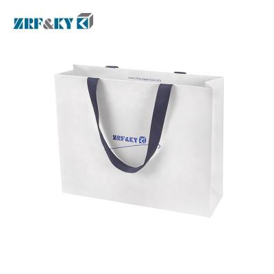 China Recyclable Custom Recycled Logo Printed White Paper Gift Shopping Packaging Bags for sale