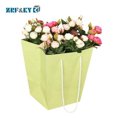 China Recyclable Fresh Flower Packaging Custom Retail Gift Shopping Decorative Paper Tote Bags for sale