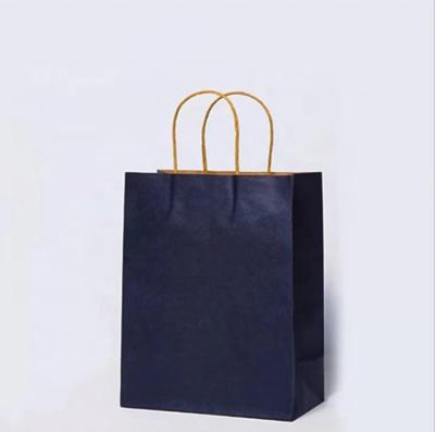 China Recycled Materials Personalized Color Kraft Paper Packaging Bag Can Be Customized With Handles for sale