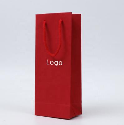 China Newest Eco-Friendly Recycled Materials Luxury Custom Logo Printing Brown Kraft Paper Wine Bottle Bag With Handle for sale