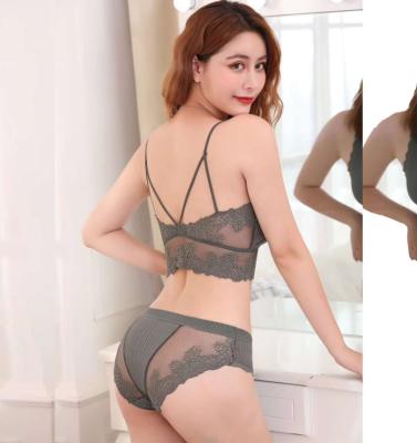 China Women's QUICK DRY seamless bra and panties set beautiful back wrapped one-piece set new style chest care bras set lace suit for sale