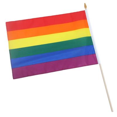 China Cheap and High Quality multiple design ripple styles rainbow gay pride lgbt stick handheld flag for sale