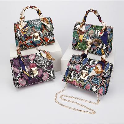 China 2021 Custom Newly Elegant Snake Scarf Handbag Durable Silk Chains Purse Bag For Ladies for sale